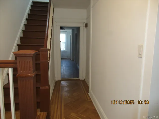 a view of hallway with stairs