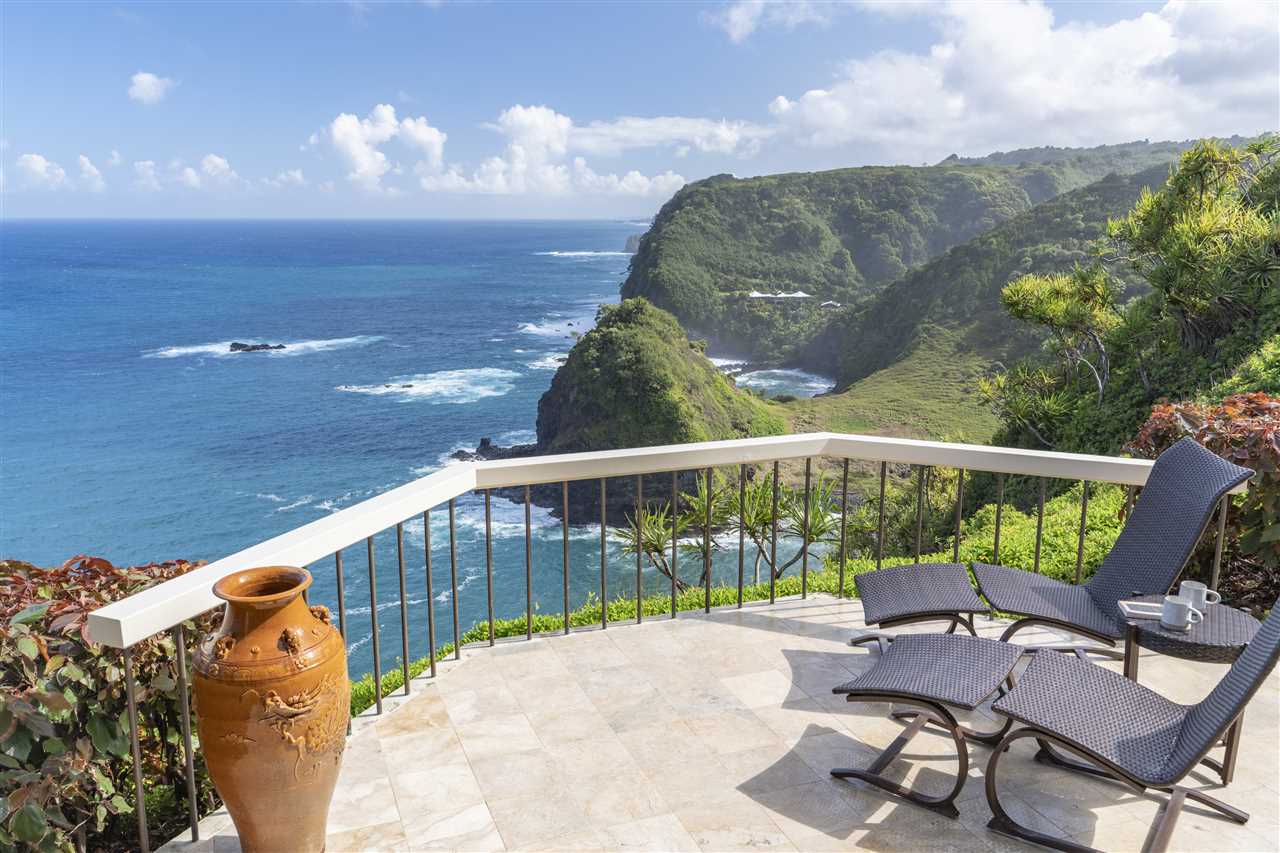668 Huelo Road Haiku, HI 96708 - Photo 1 of 28 a view of a balcony with furniture