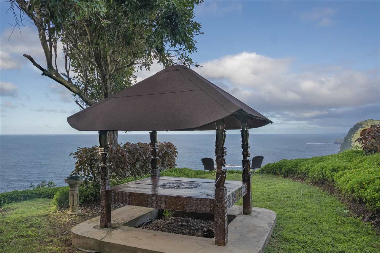 668 Huelo Road Haiku, HI 96708 - Photo 23 of 28 a view of a garden with an outdoor seating