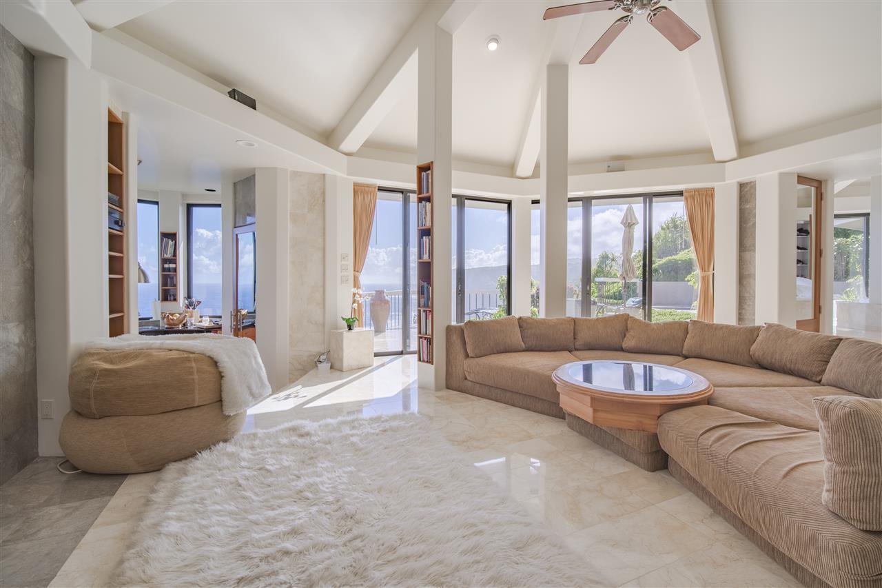 668 Huelo Road Haiku, HI 96708 - Photo 4 of 28 a living room with furniture and a large window
