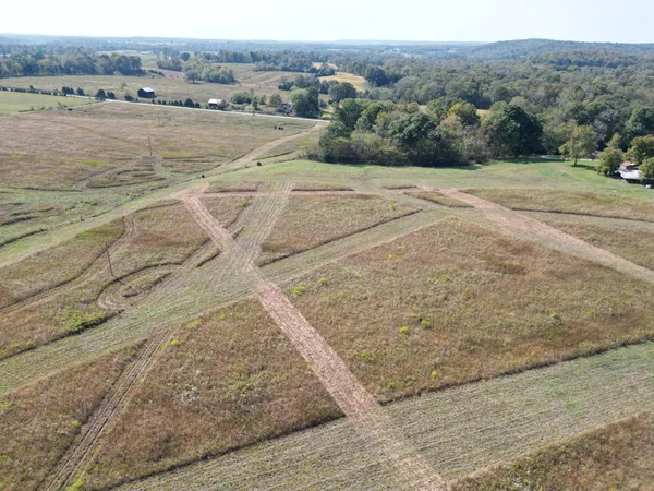 a view of a lake with an outdoor space