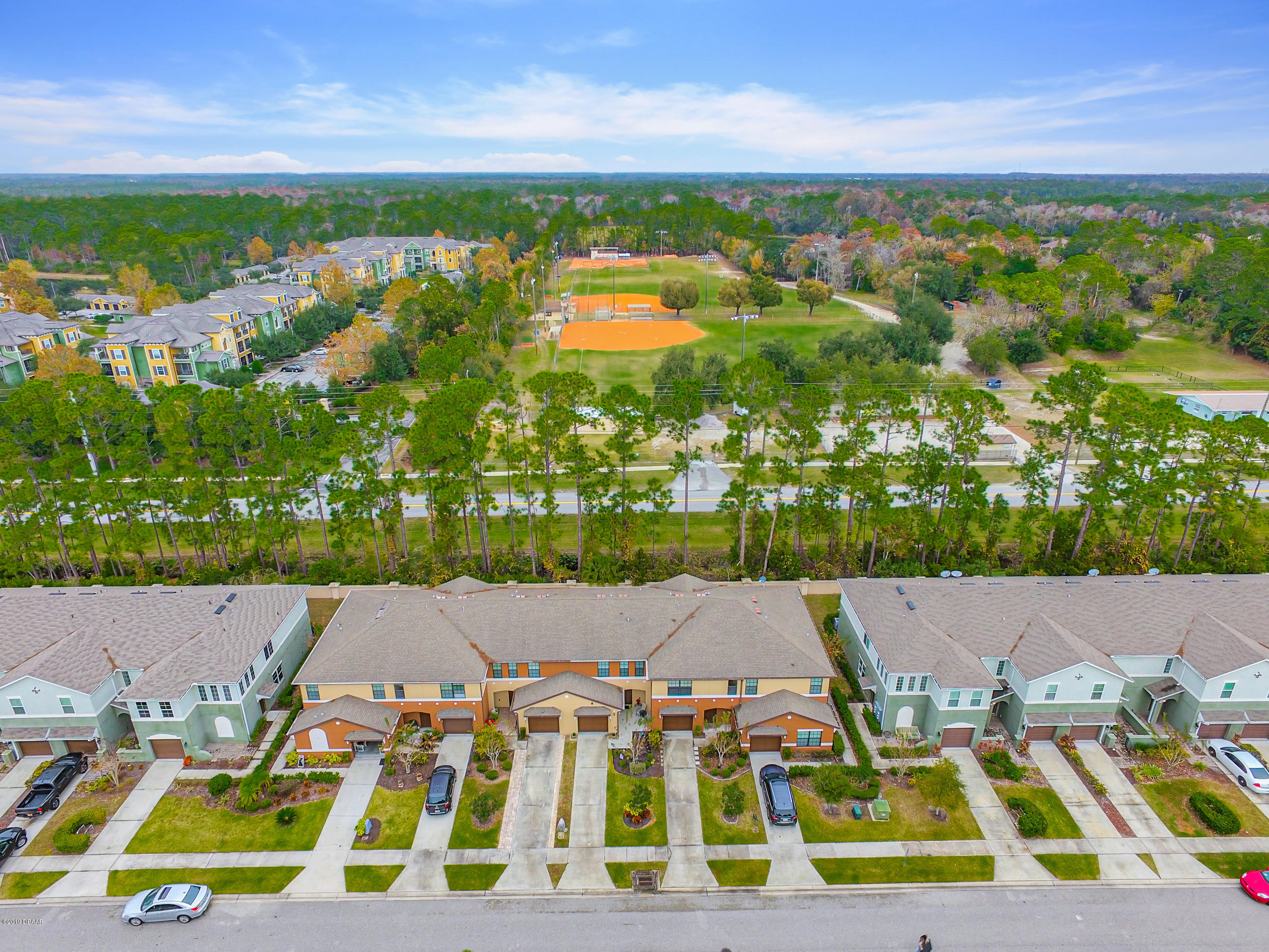 180 Tarracina Way Daytona Beach, FL 32117 - Photo 37 of 39 a view of yard with swimming pool and outdoor space