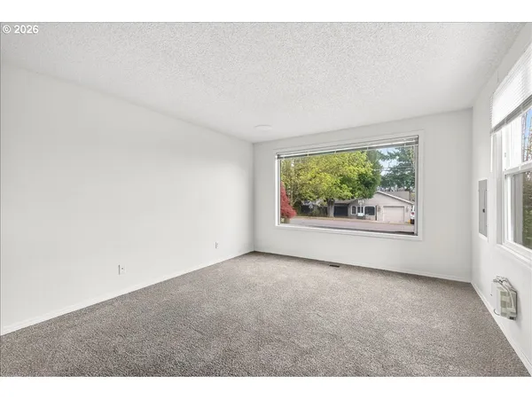 a view of a window in an empty room