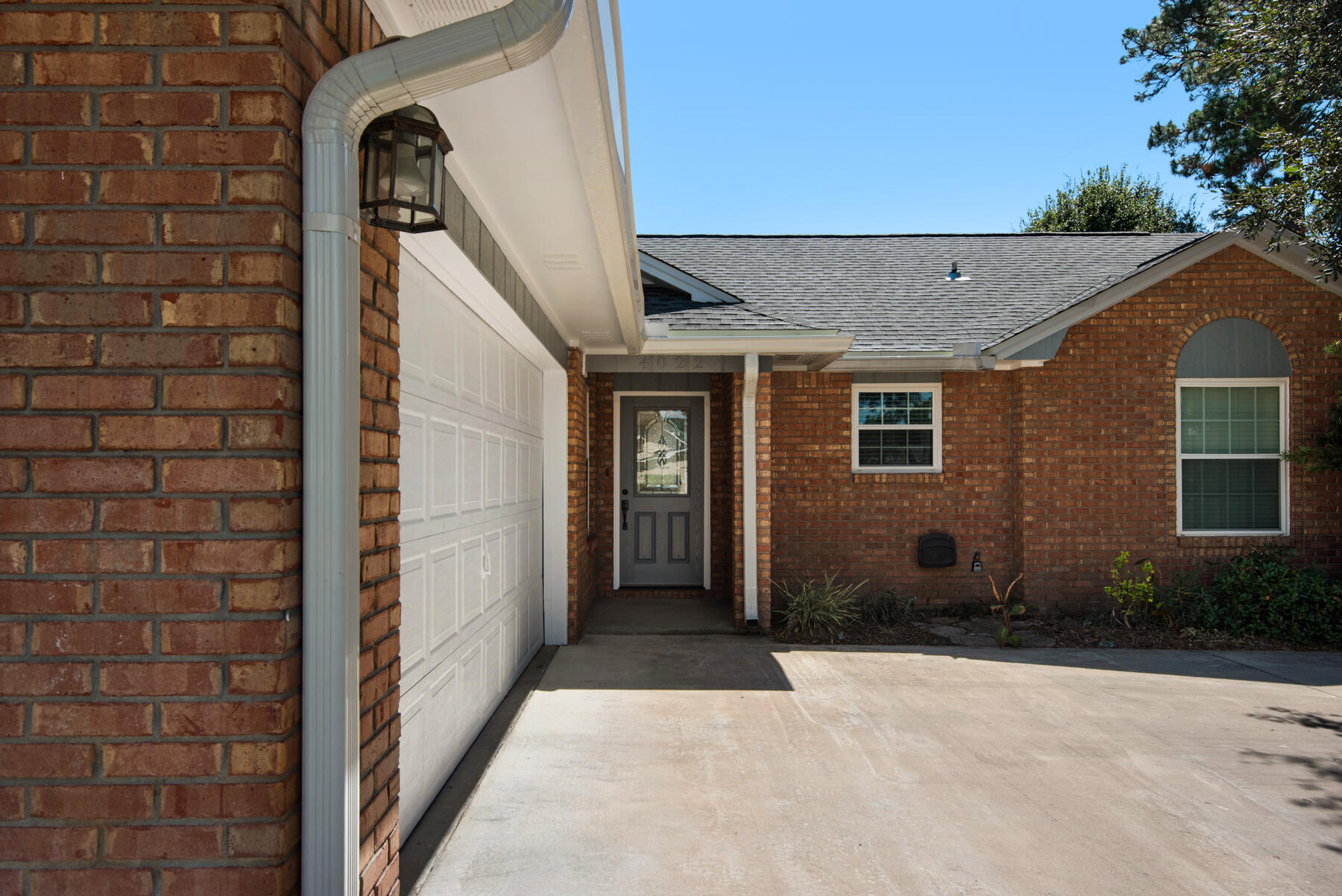 4022 13th Street Niceville, FL 32578 - Photo 4 of 37 a view of a brick house with windows