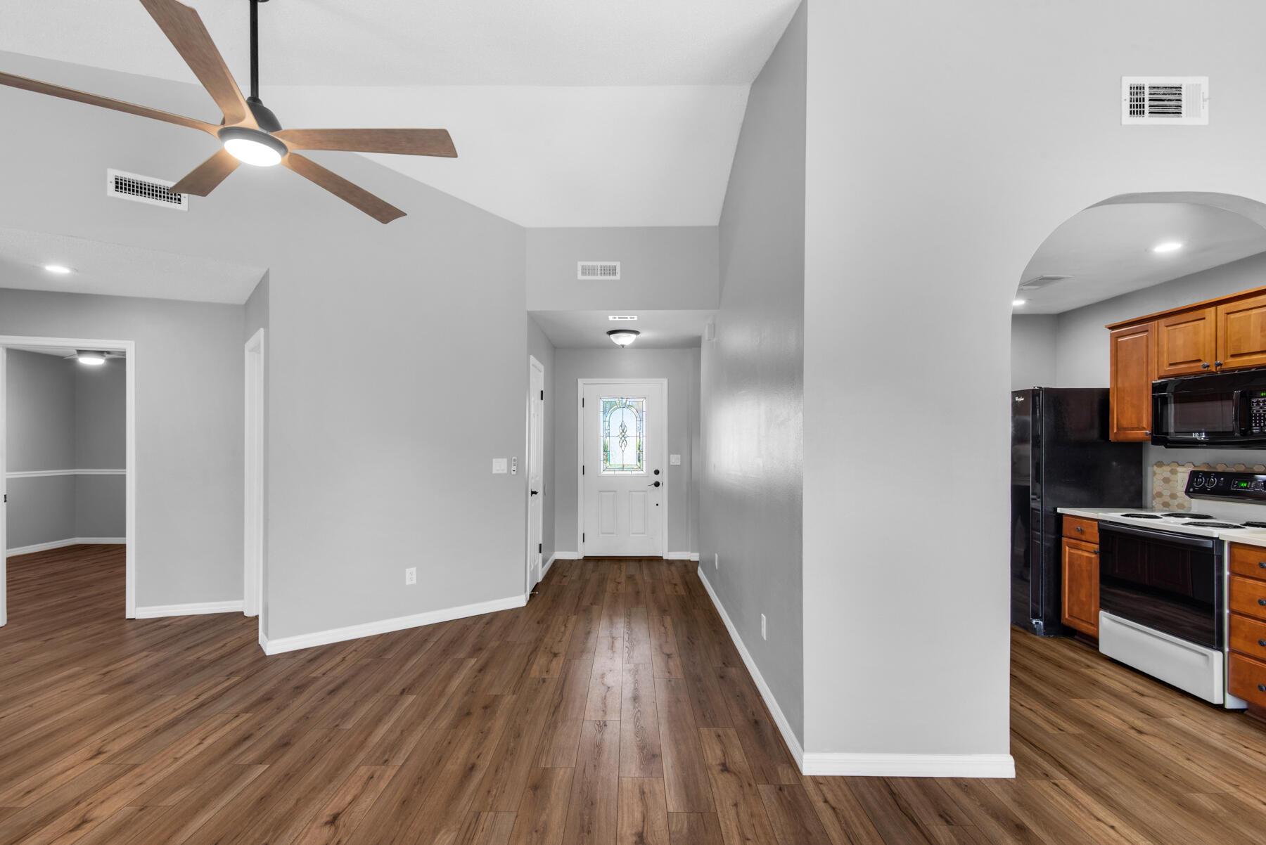 4022 13th Street Niceville, FL 32578 - Photo 5 of 37 a view of a kitchen from a hallway