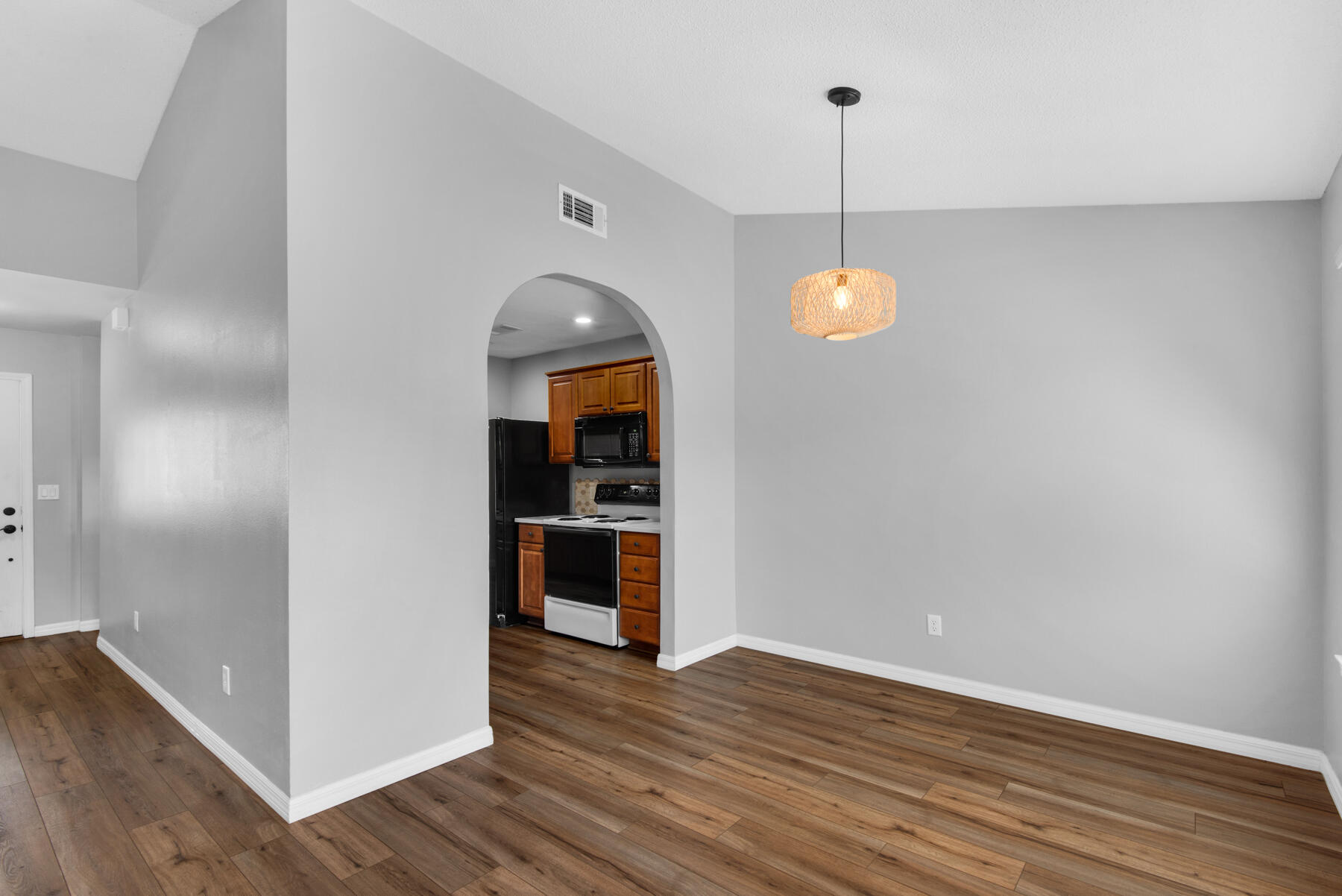 4022 13th Street Niceville, FL 32578 - Photo 8 of 37 a view of a room with wooden floor and windows