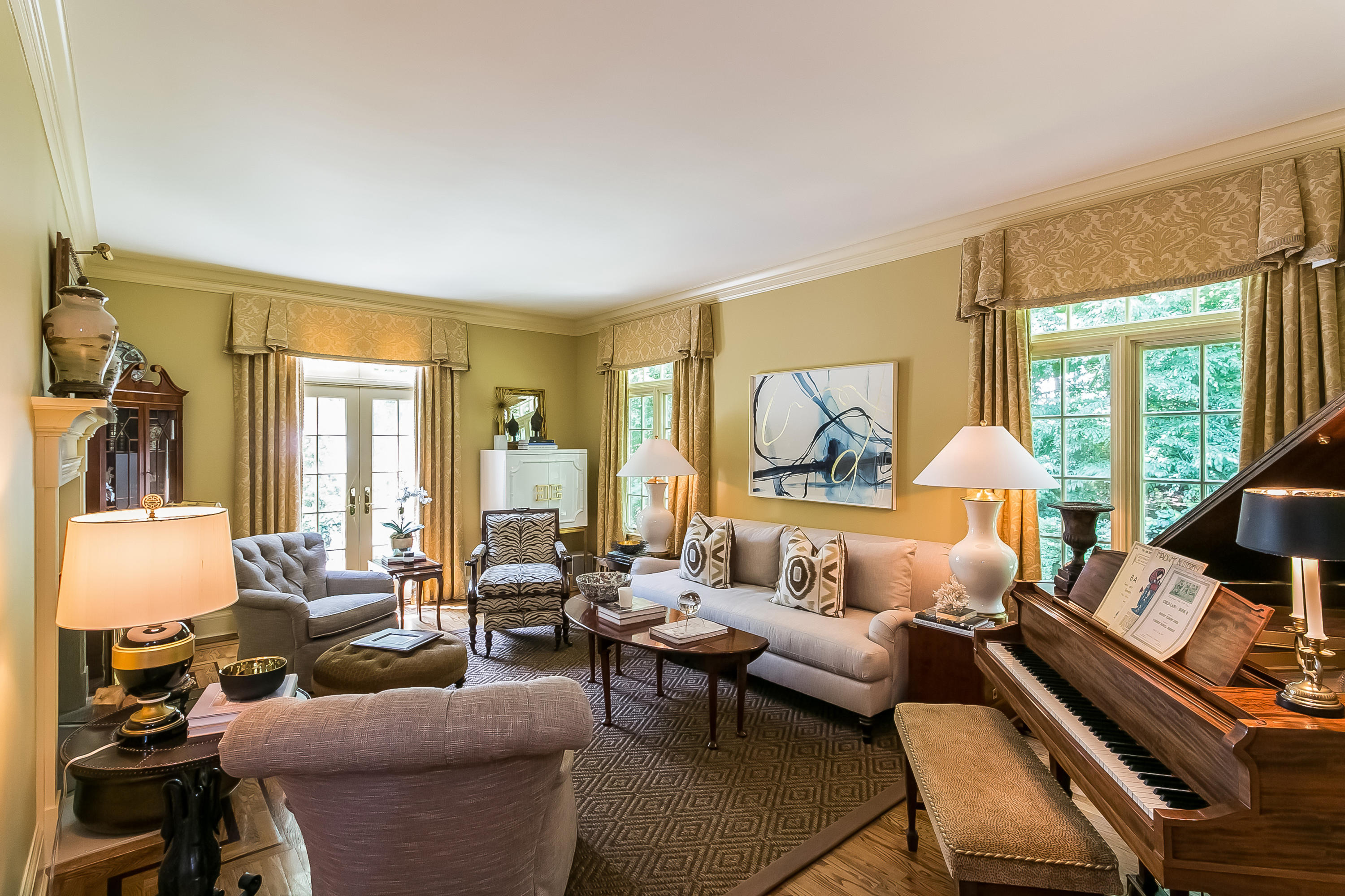 50 Deepwood Road Darien, CT 06820 - Photo 11 of 54 a living room with furniture fireplace and a large window