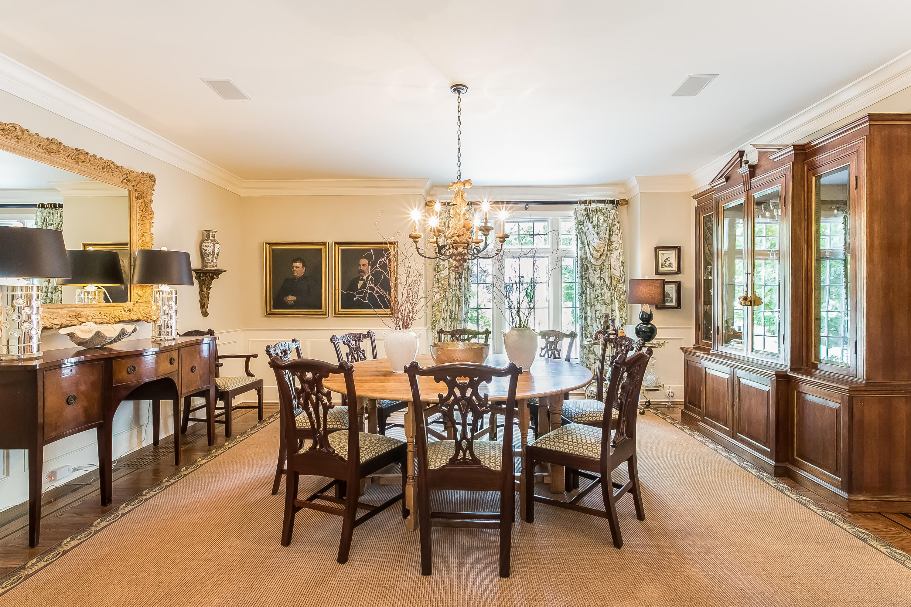 50 Deepwood Road Darien, CT 06820 - Photo 12 of 54 a view of a dining room with furniture window and outside view
