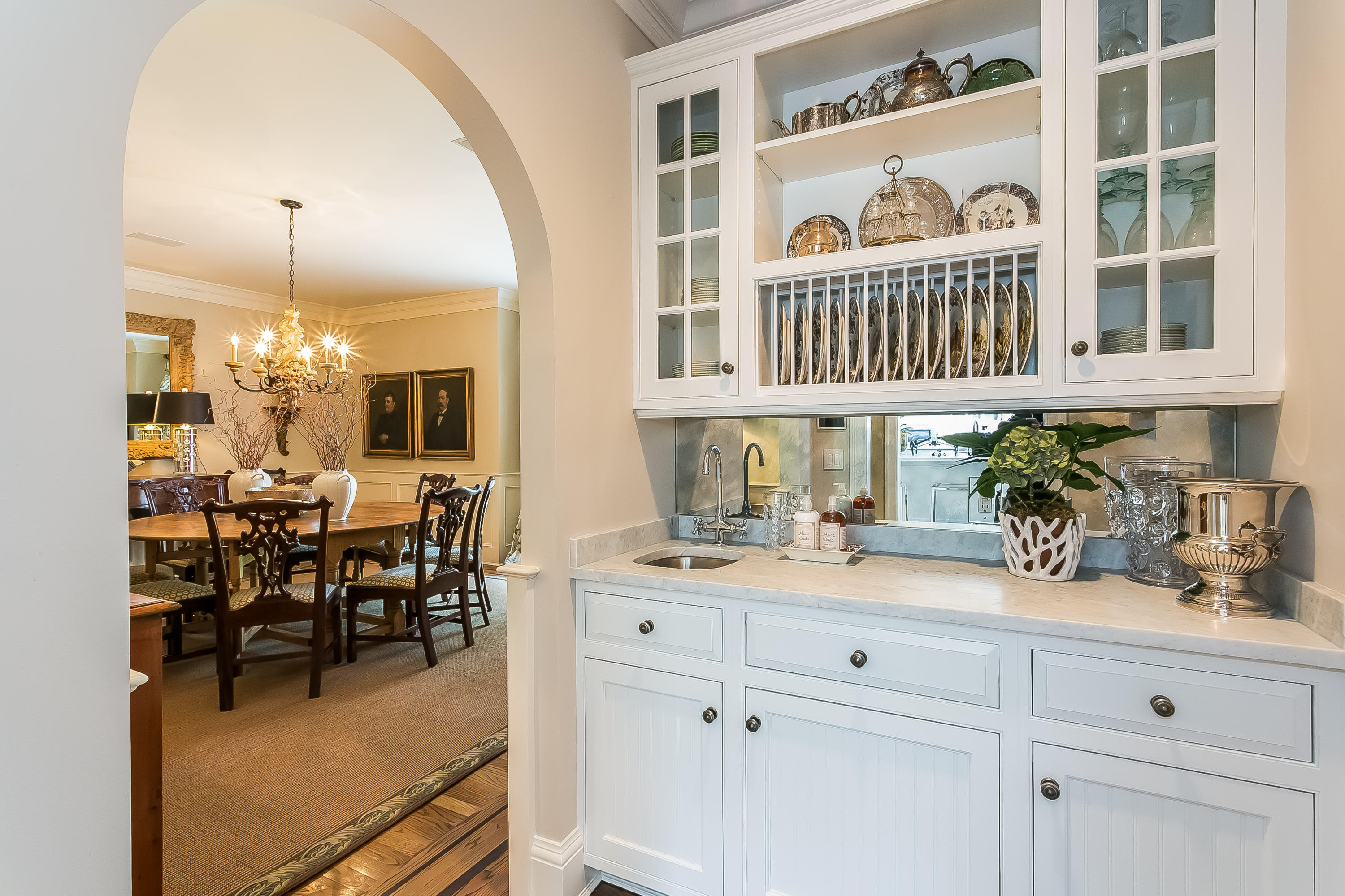 50 Deepwood Road Darien, CT 06820 - Photo 14 of 54 a kitchen with cabinets and chairs