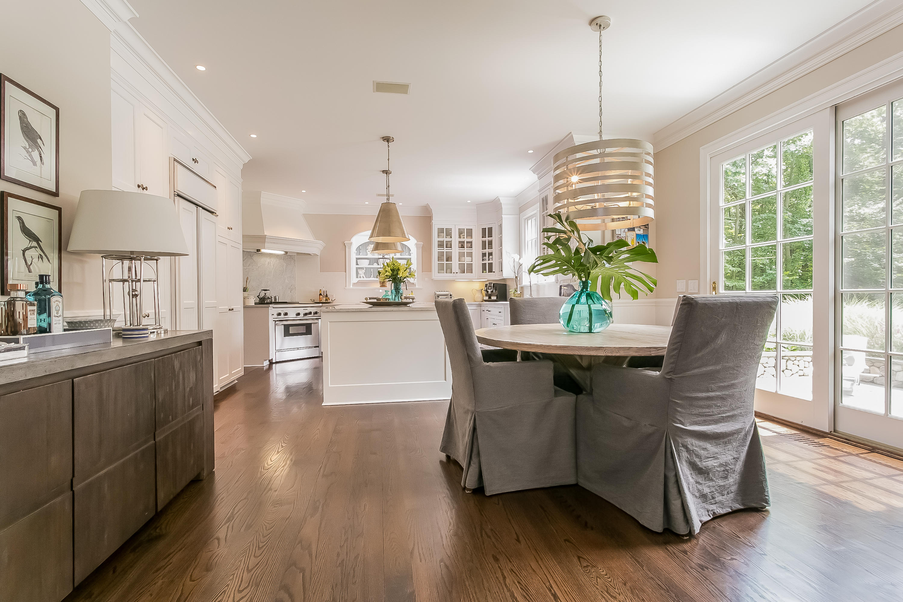 50 Deepwood Road Darien, CT 06820 - Photo 16 of 54 a view of a dining room with furniture window and wooden floor
