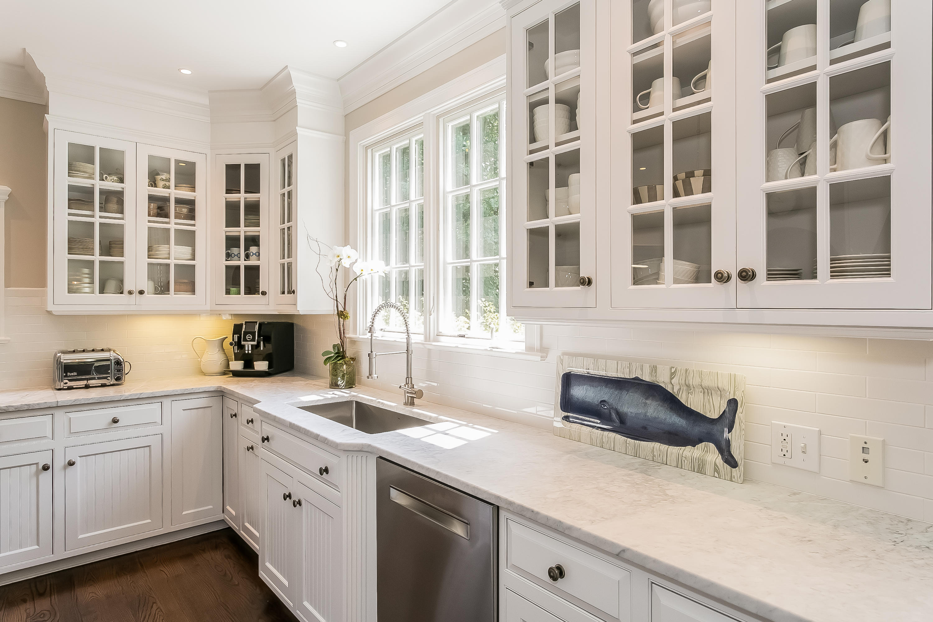50 Deepwood Road Darien, CT 06820 - Photo 18 of 54 a kitchen with a sink and cabinets