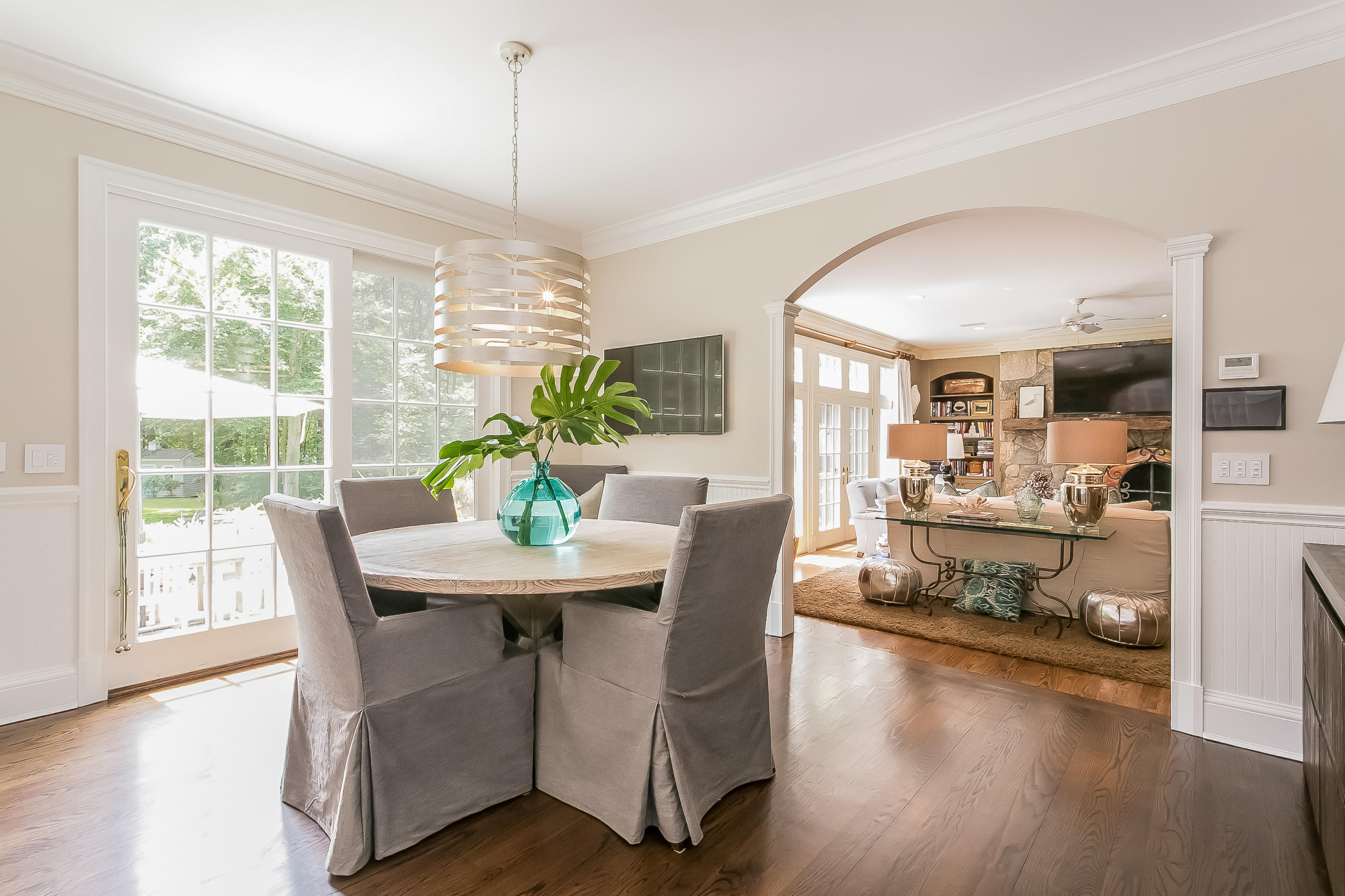 50 Deepwood Road Darien, CT 06820 - Photo 21 of 54 a dining room with furniture window and wooden floor