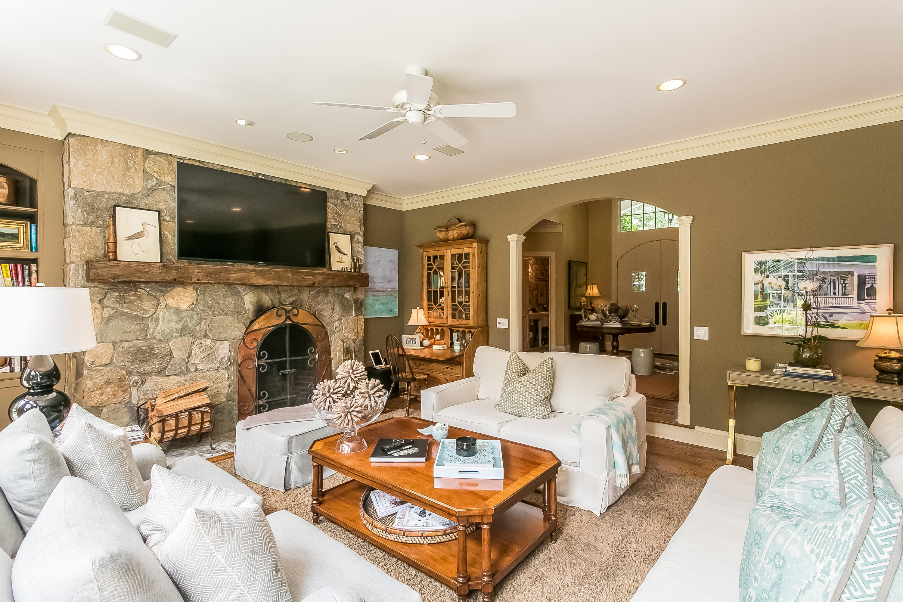 50 Deepwood Road Darien, CT 06820 - Photo 24 of 54 a living room with fireplace furniture and a flat screen tv