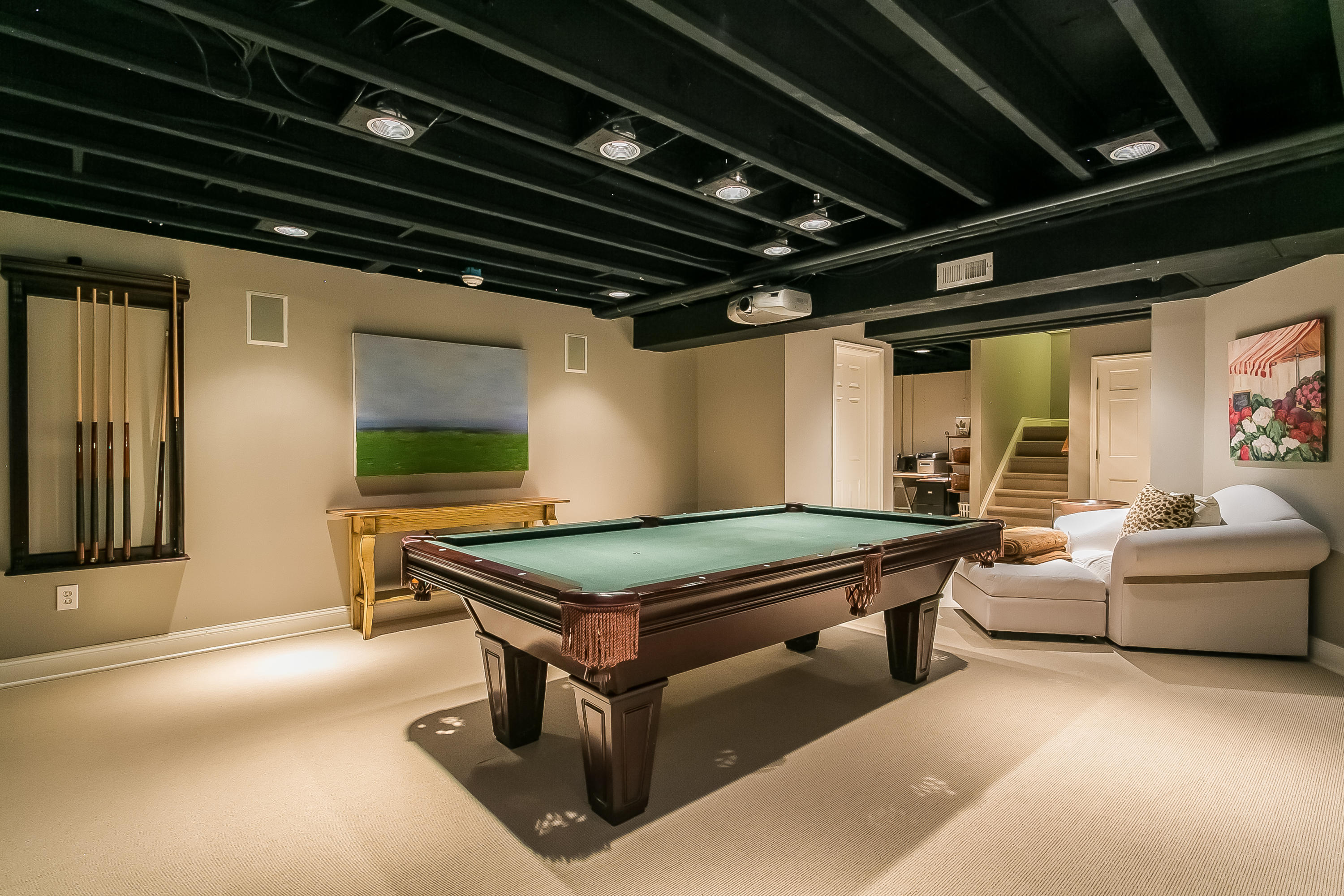 50 Deepwood Road Darien, CT 06820 - Photo 40 of 54 a room with furniture and flat screen tv