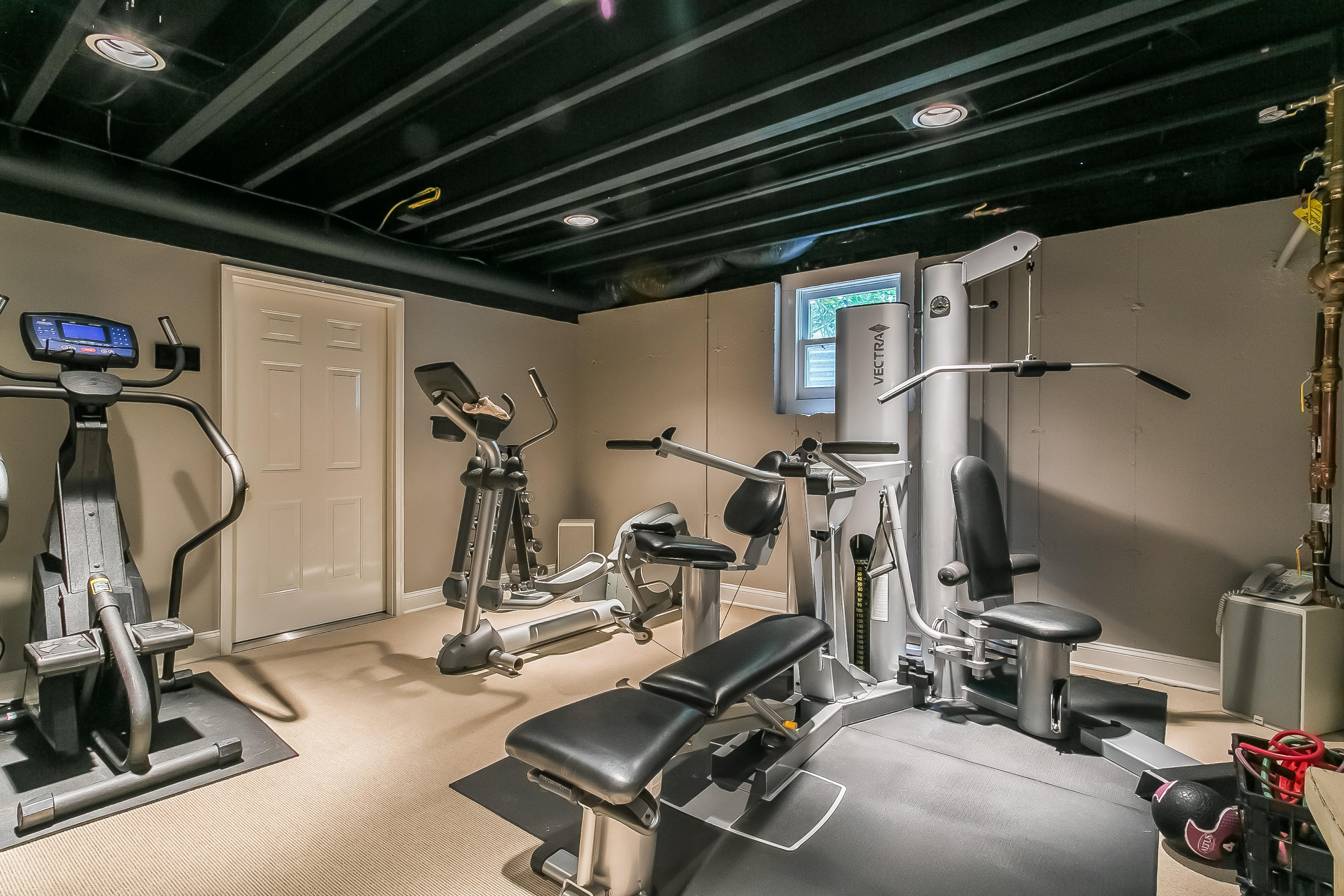 50 Deepwood Road Darien, CT 06820 - Photo 45 of 54 a view of a room with gym equipment