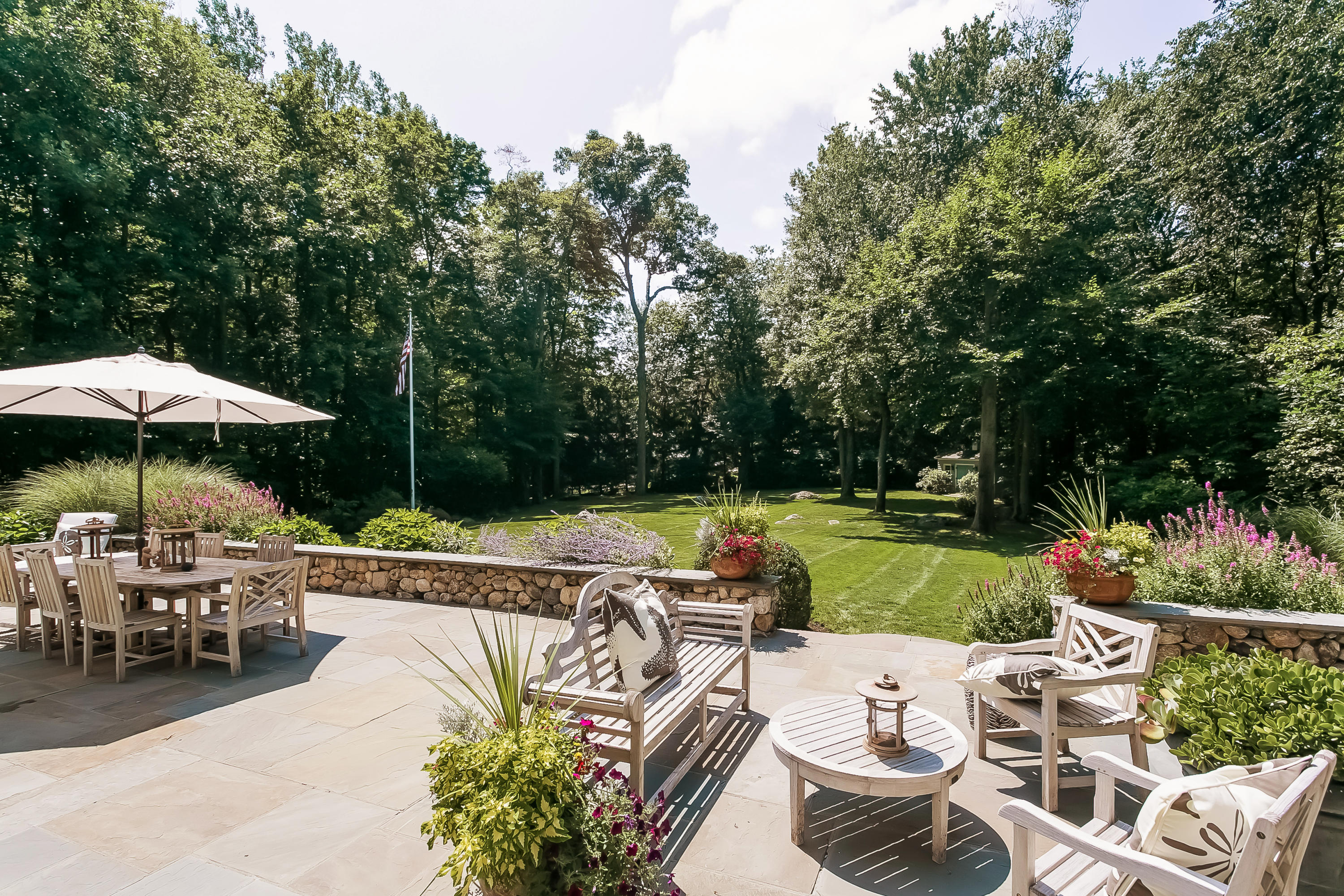 50 Deepwood Road Darien, CT 06820 - Photo 46 of 54 a view of a patio with furniture and backyard