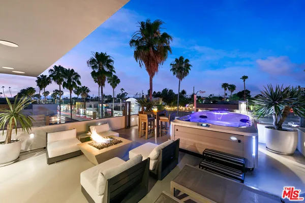 a view of a backyard with a patio
