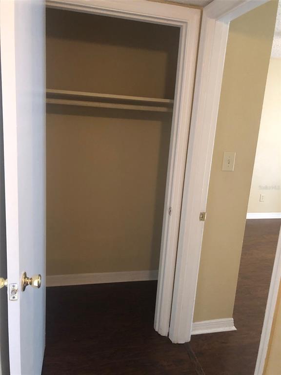 315 Wymore Road, Unit 207 Altamonte Springs, FL 32714 - Photo 15 of 21 an empty room with wooden floor