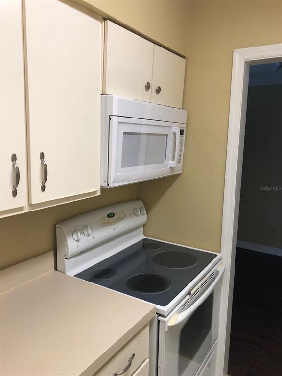 315 Wymore Road, Unit 207 Altamonte Springs, FL 32714 - Photo 7 of 21 a utility room with dryer and washer
