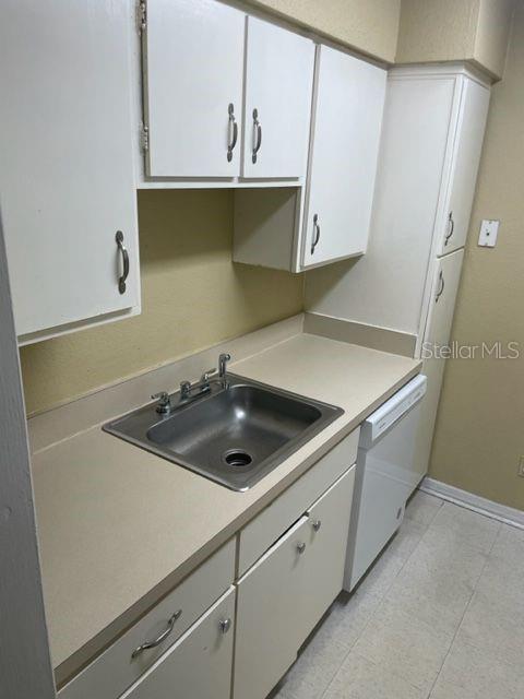 315 Wymore Road, Unit 207 Altamonte Springs, FL 32714 - Photo 9 of 21 a utility room with dryer and washer