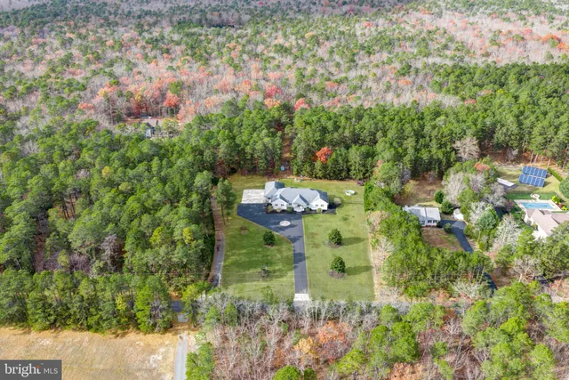 a large spacious bathroom with a large tub and sink