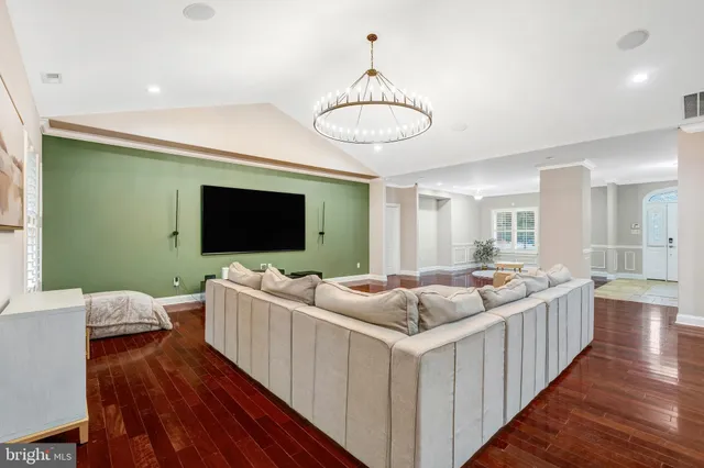 a kitchen with stainless steel appliances granite countertop wooden cabinets and a stove top oven