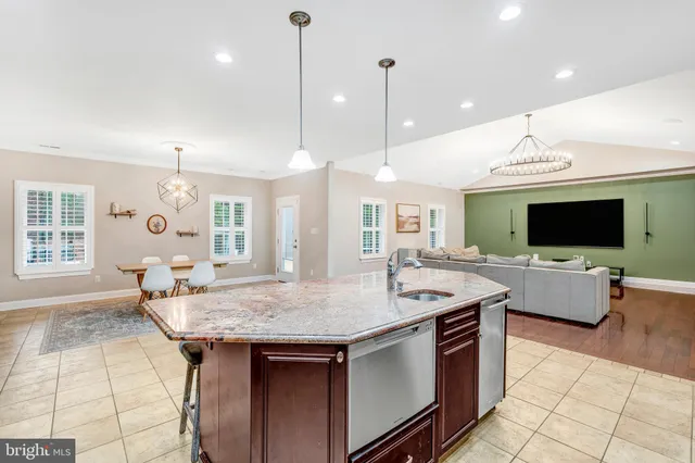 a living room with furniture and windows