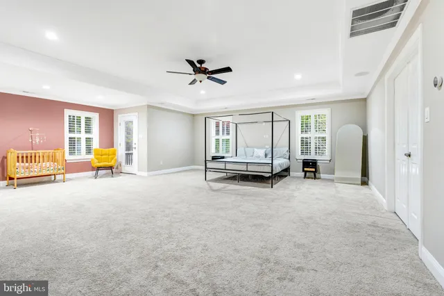 a room with a cabinets and window