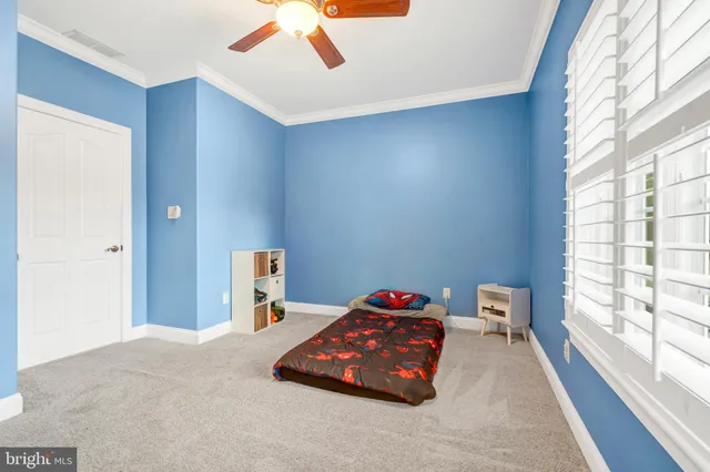 a view of a patio in a backyard