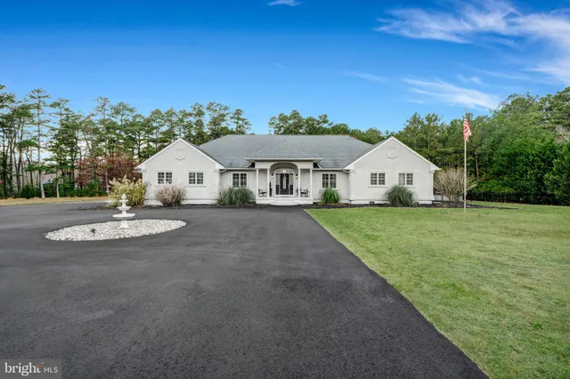 a view of house with outdoor space and street view