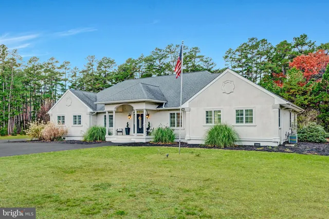 a view of a house with a big yard