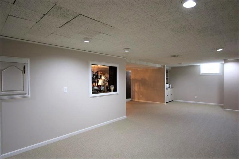560 Justabout Road Peters Township, PA 15367 - Photo 17 of 25 MASSIVE 36x12 Game Room recently remodeled 2014 opens into additional 14x16 room both w/ Newer Carpeting plus Powder Room