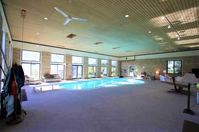560 Justabout Road Peters Township, PA 15367 - Photo 3 of 25 INCREDIBLE Pool House w/ Snowman Shaped Heated Inground Pool w/ Diving Board & Lots of Sliding Glass Doors calling in the Natural Light! Incredible 3953 square feet of enjoyment!
