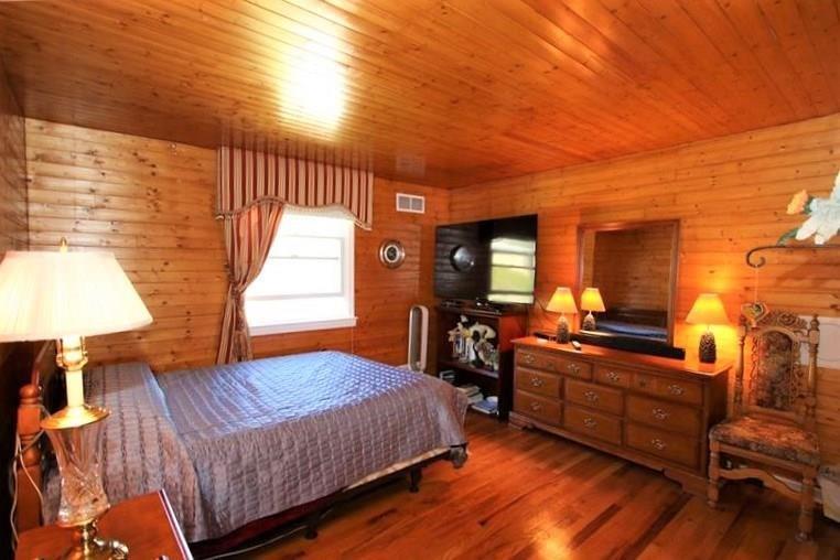560 Justabout Road Peters Township, PA 15367 - Photo 22 of 25 GORGEOUS Knotty Wood Panel & Hardwood Floors in 12x12 Bedroom