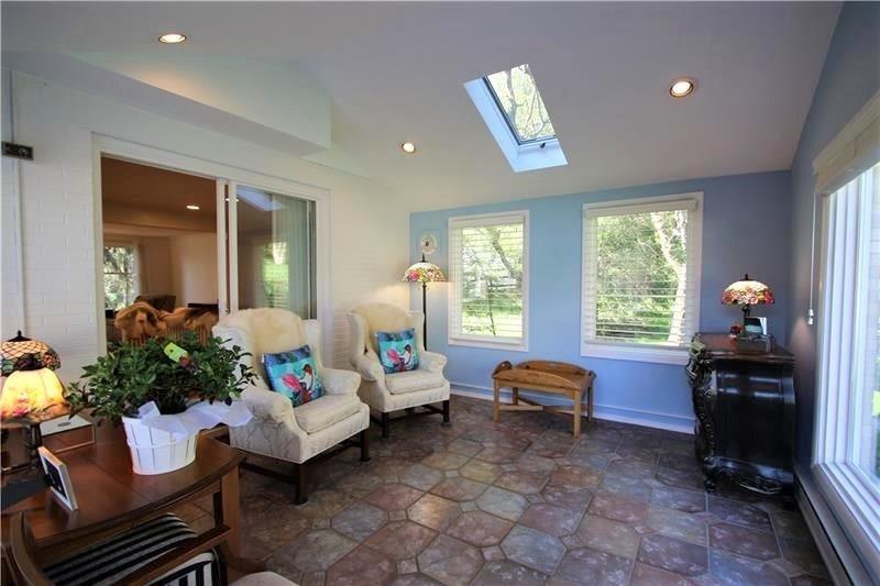 560 Justabout Road Peters Township, PA 15367 - Photo 9 of 25 Wall of Windows & 2 Skylights in 13x12 Sunroom w/ Newer Ceramic Tile Flooring, Recessed Lighting and Door to Back Patio plus Sliding Glass Door to Living Room.