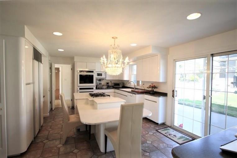 560 Justabout Road Peters Township, PA 15367 - Photo 10 of 25 Gourmet 20x15 Eat-in Kitchen w/ Newer Double Oven(2014), Gas Cook Top (2007) on Breakfast Island, Recessed Lighting, Built-in Desk area, GORGEOUS Chandelier, Sliding Glass Doors to Back Patio and Newer Attractive Ceramic Tile Floors (2012)