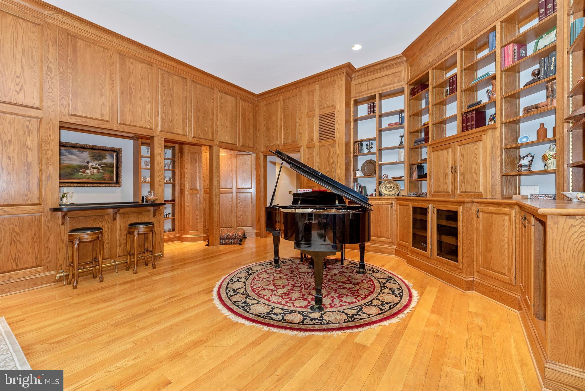 5386 Stone Road Frederick, MD 21703 - Photo 33 of 66 Family room with built-in cabinets and woodworking