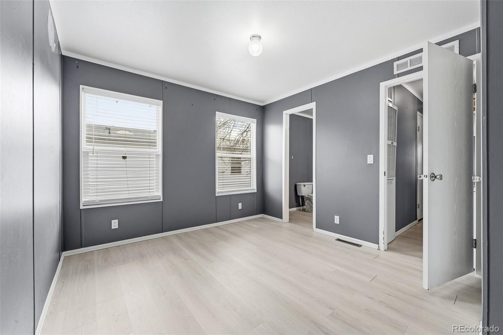 12205 Perry Street, Unit 271 Broomfield, CO 80020 - Photo 17 of 34 a view of an empty room with window and closet area