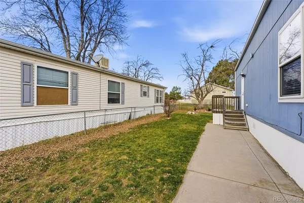 a house view with a backyard space