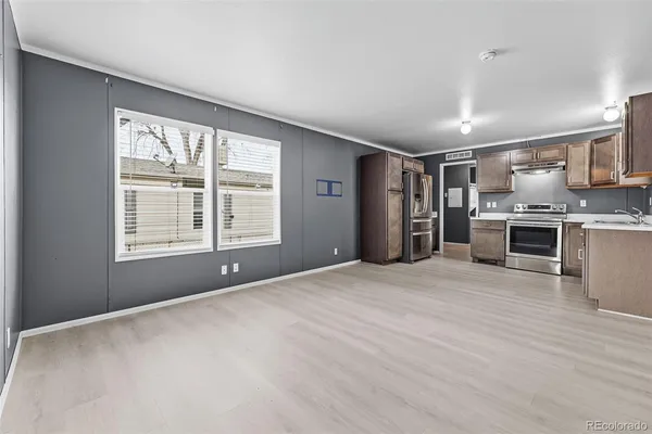 a view of an empty room with a window