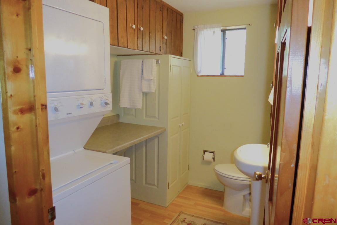 21550 2300th Road Cedaredge, CO 81413 - Photo 14 of 35 a bathroom with a sink toilet and shower