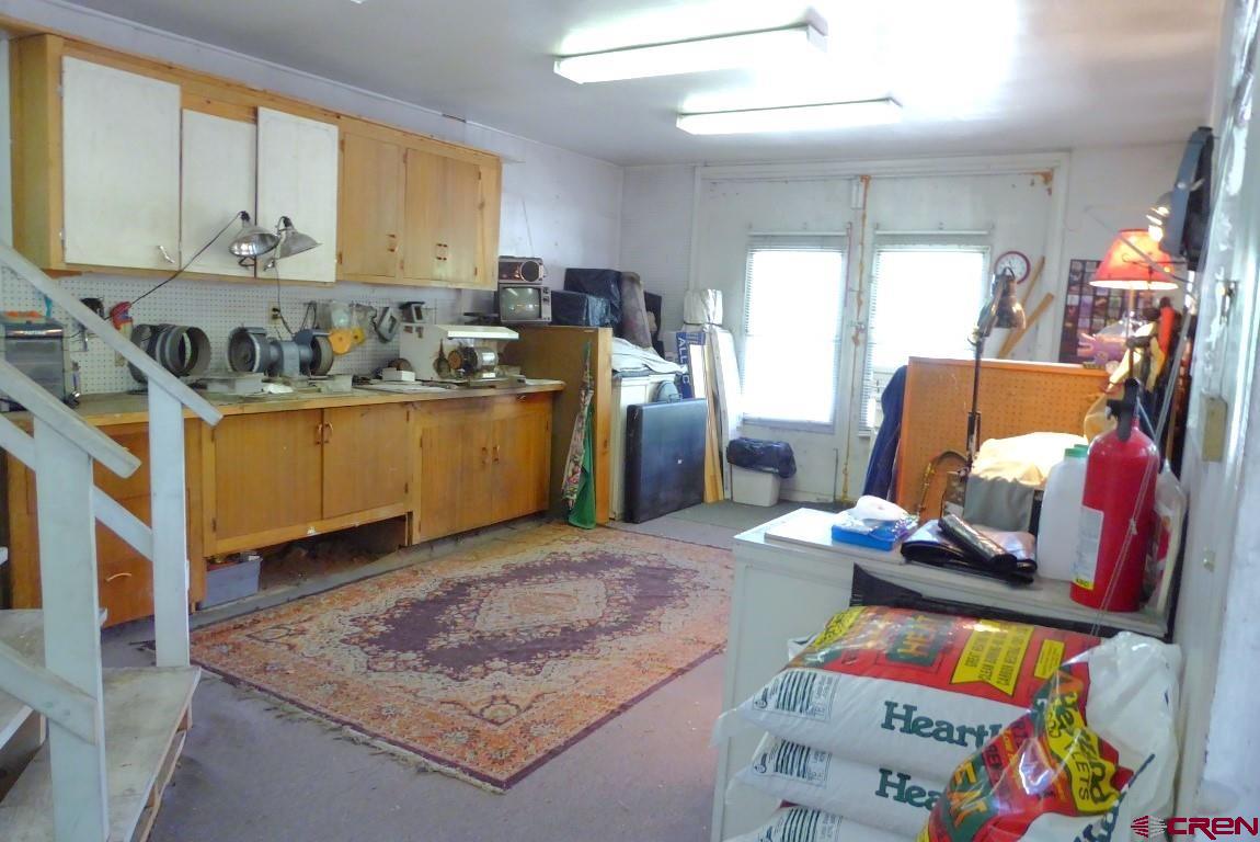 21550 2300th Road Cedaredge, CO 81413 - Photo 29 of 35 a living room with furniture and a window