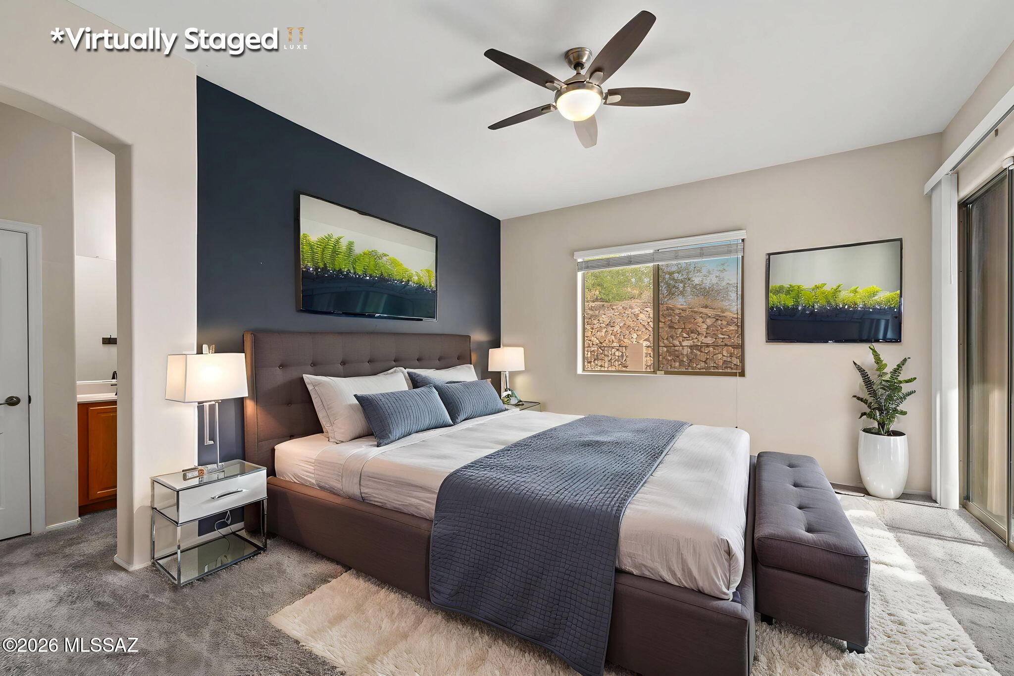 13668 East High Plains Ranch Street Vail, AZ 85641 - Photo 25 of 51 a bedroom with a bed and a window