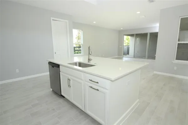 a view of a kitchen with a sink