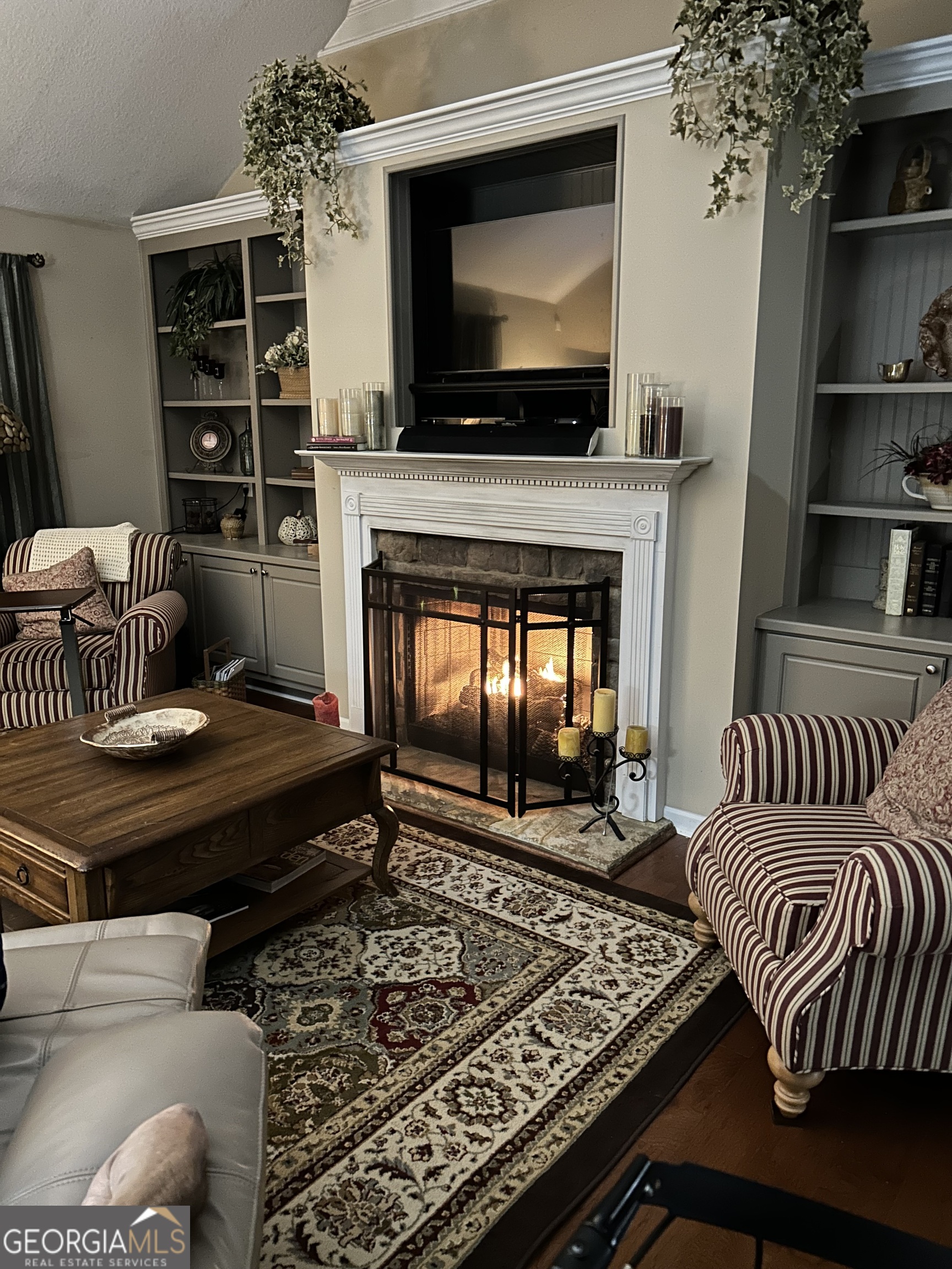 950 John Lovelace Road LaGrange, GA 30241 - Photo 13 of 47 a living room with furniture and a flat screen tv