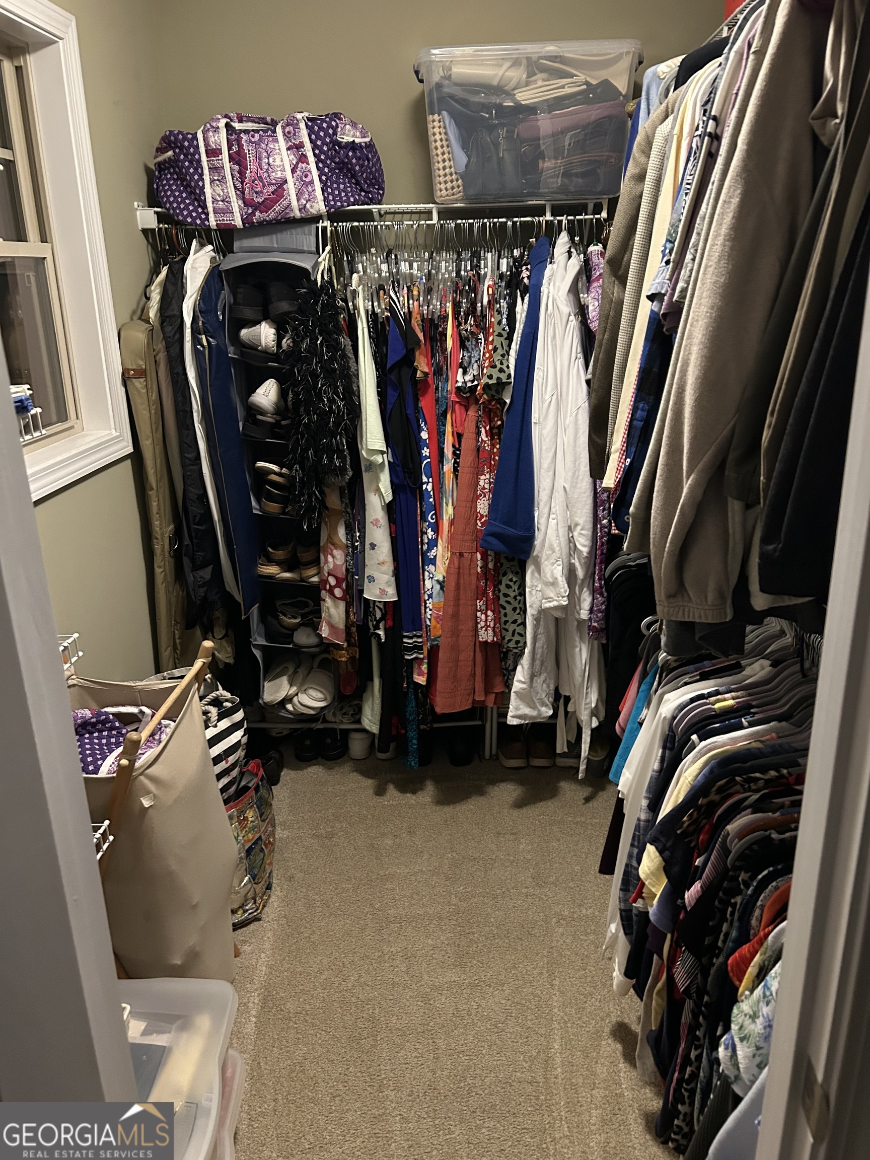 950 John Lovelace Road LaGrange, GA 30241 - Photo 26 of 47 a view of walk in closet with clothes and shoes