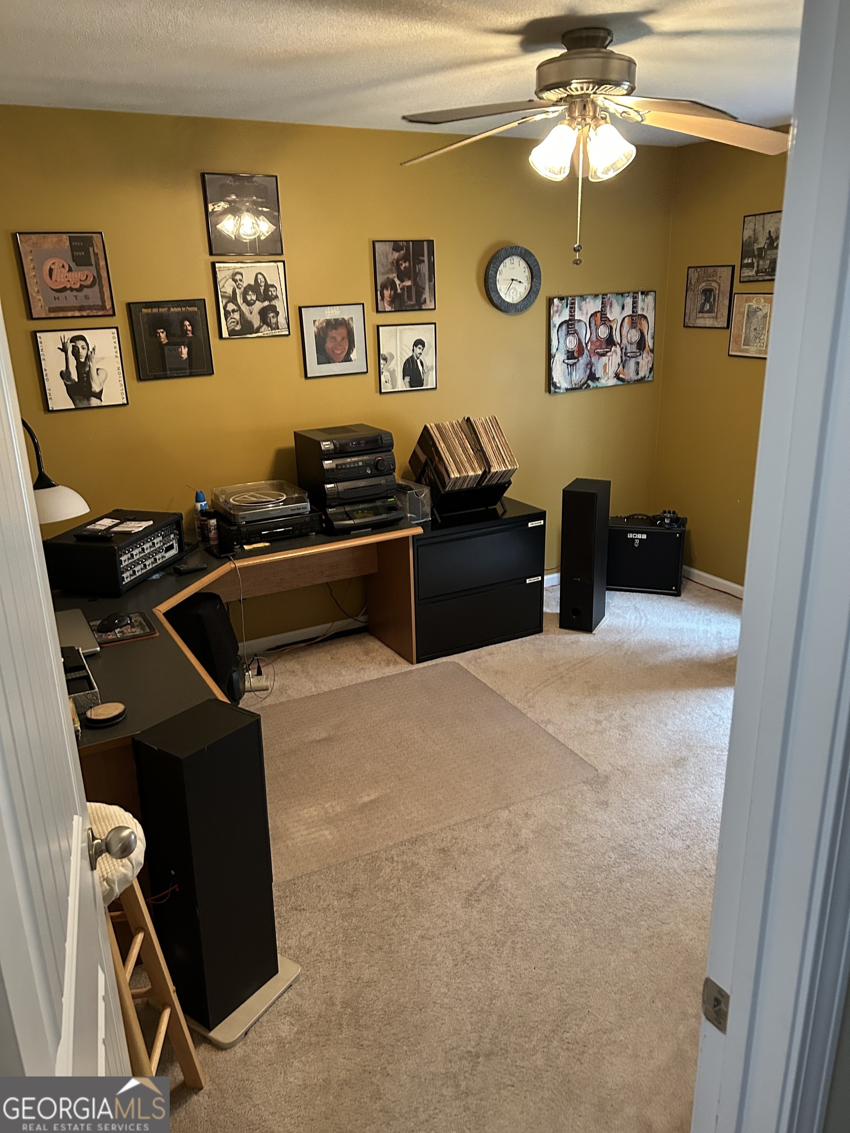 950 John Lovelace Road LaGrange, GA 30241 - Photo 31 of 47 a bed room with a bed and paintings on the wall