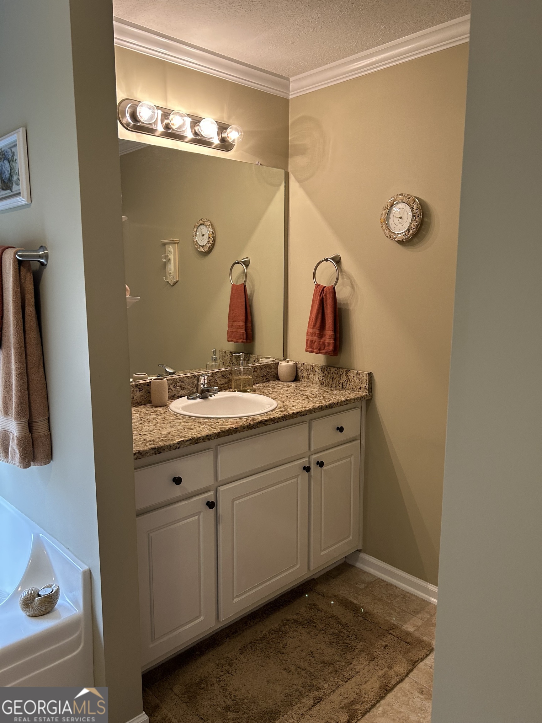 950 John Lovelace Road LaGrange, GA 30241 - Photo 39 of 47 a bathroom with a double vanity sink and mirror