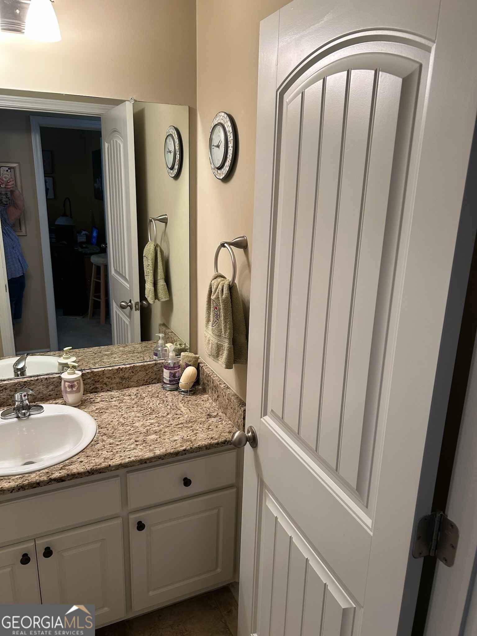 950 John Lovelace Road LaGrange, GA 30241 - Photo 41 of 47 a bathroom with a granite countertop sink and a mirror