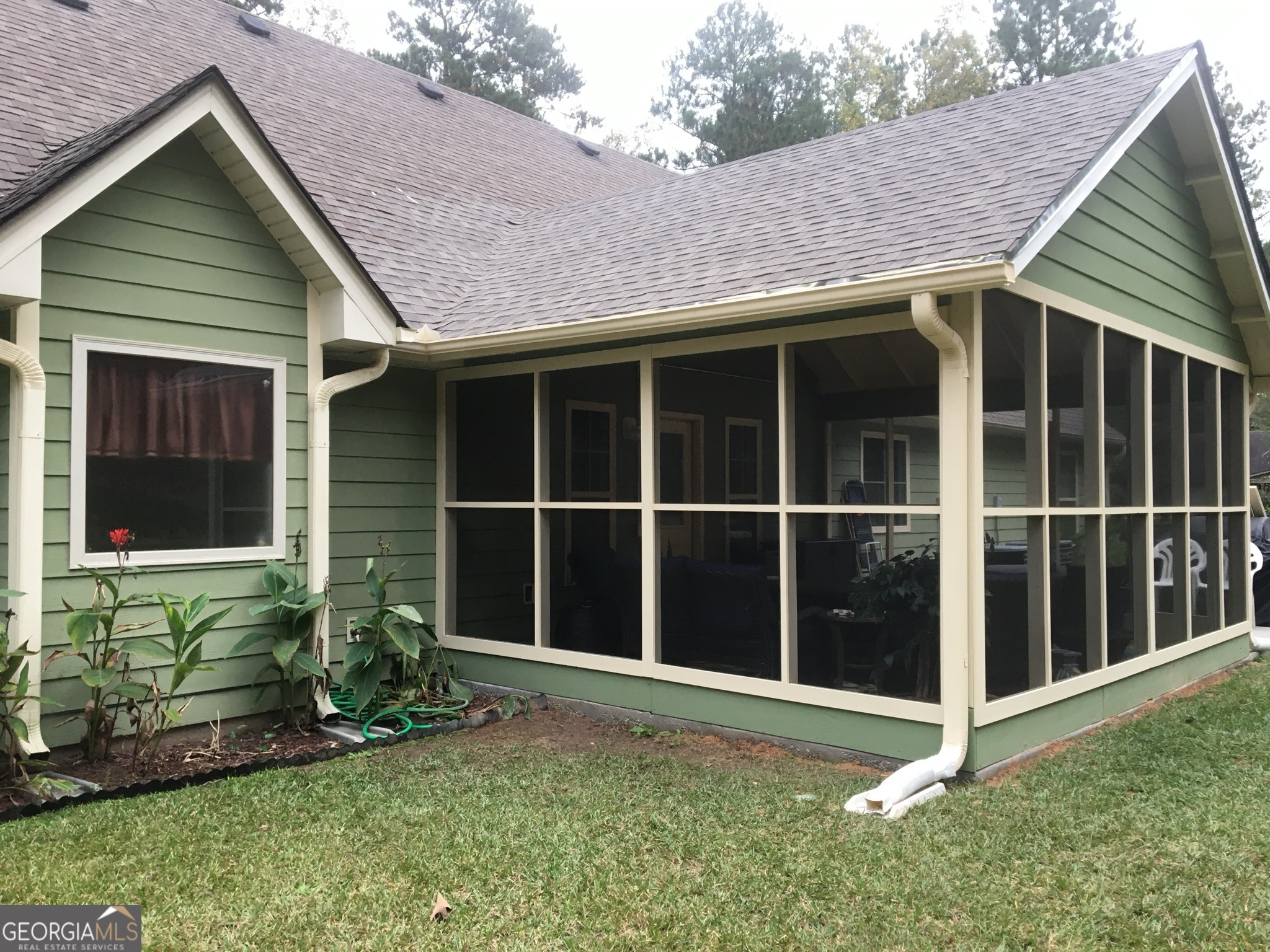 950 John Lovelace Road LaGrange, GA 30241 - Photo 5 of 47 a view of a backyard with potted plants and large tree